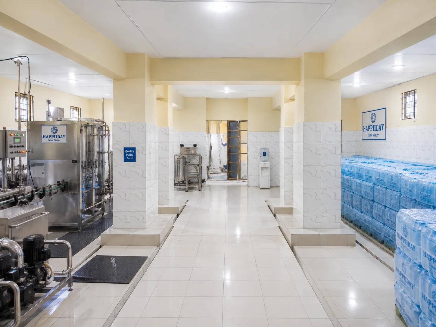 Clean Happiiday water production facility with packaged water and bottling equipment
